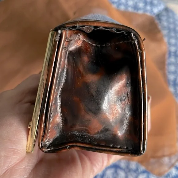 Authentic Tory Burch glass case. Animal print. Magnetic closure. Gold trim . EUC - Picture 5 of 7